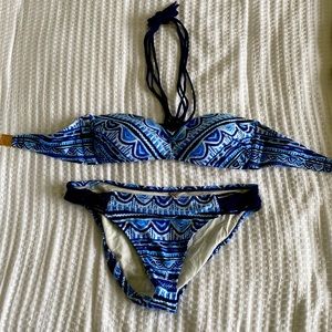 Swim suit size Small top. Medium bottom